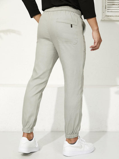 Letter Patched Drawstring Waist Tapered Pants